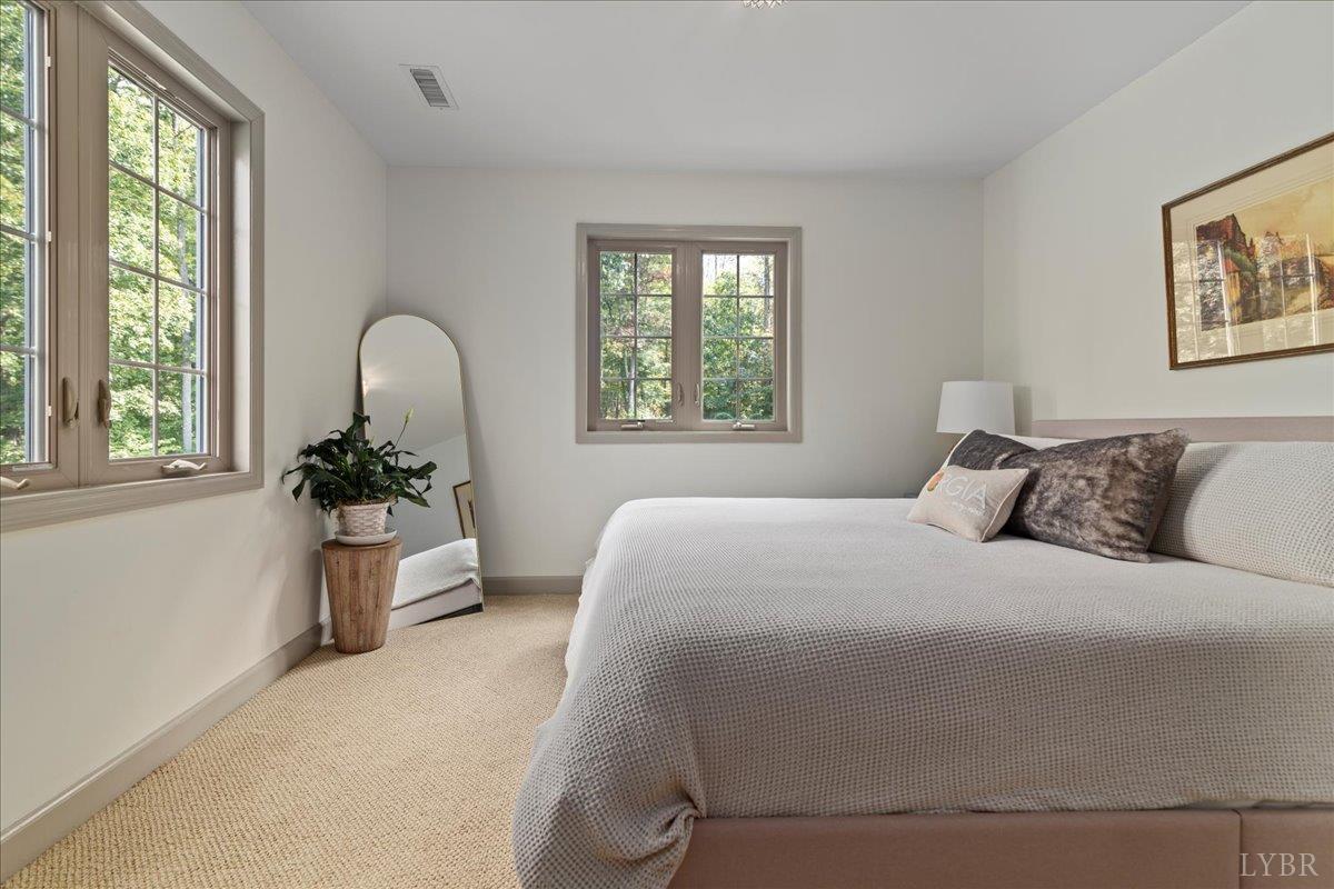 181 Mobley Mountain Road Amherst, VA 24521 - Photo 68 of 98 a bedroom with a bed and a window