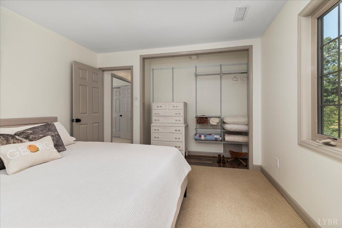 181 Mobley Mountain Road Amherst, VA 24521 - Photo 69 of 98 a bedroom with a bed and a window