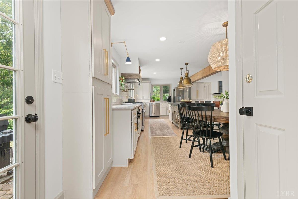 181 Mobley Mountain Road Amherst, VA 24521 - Photo 71 of 98 a dining room with furniture and a table