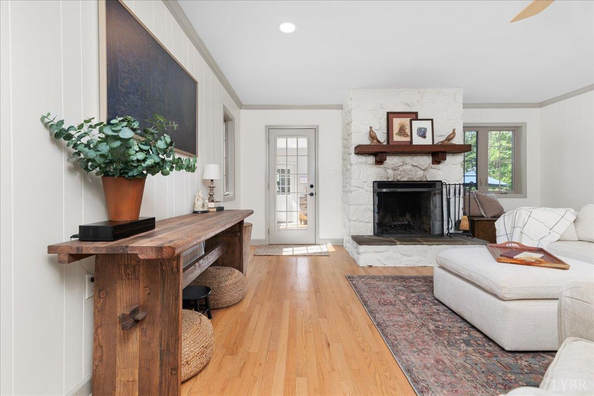 181 Mobley Mountain Road Amherst, VA 24521 - Photo 8 of 98 a living room with furniture and a fireplace
