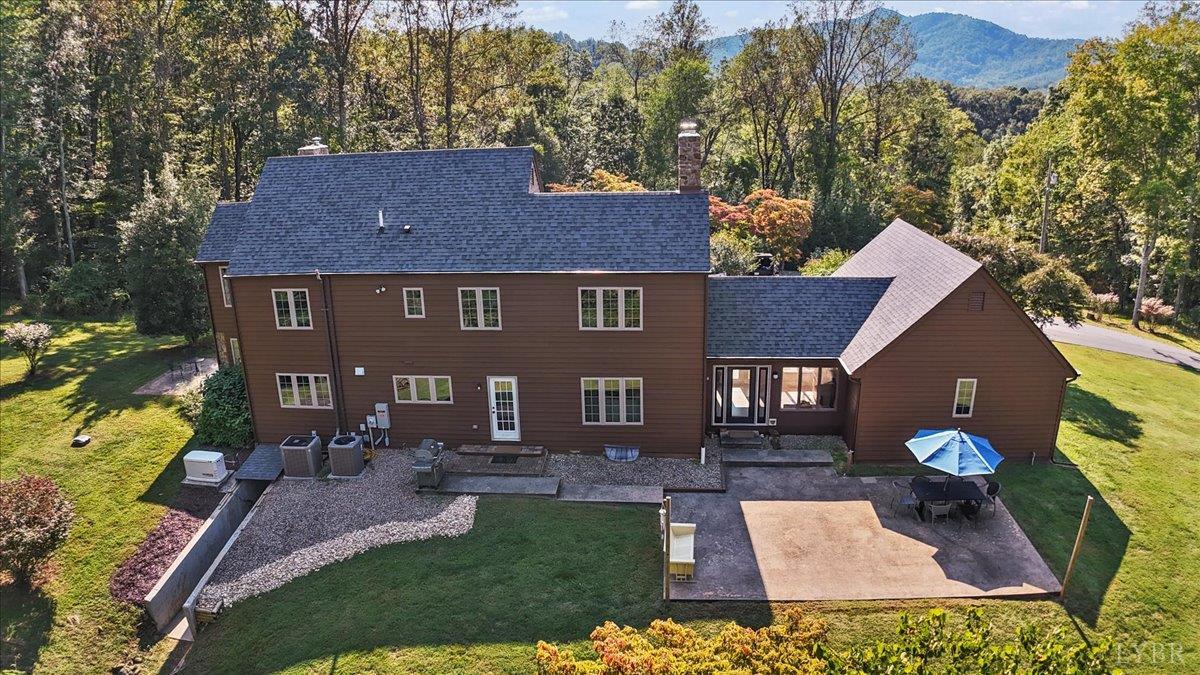 181 Mobley Mountain Road Amherst, VA 24521 - Photo 82 of 98 front view of a house with a yard