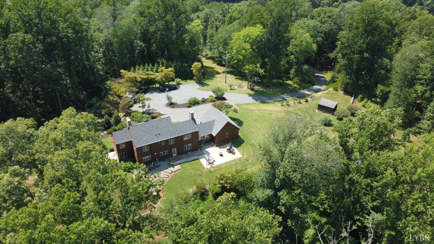 181 Mobley Mountain Road Amherst, VA 24521 - Photo 93 of 98 aerial view of a house with a yard and trees