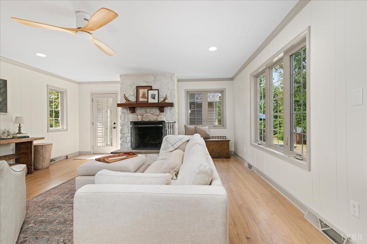 181 Mobley Mountain Road Amherst, VA 24521 - Photo 10 of 98 a living room with furniture large window and a fireplace