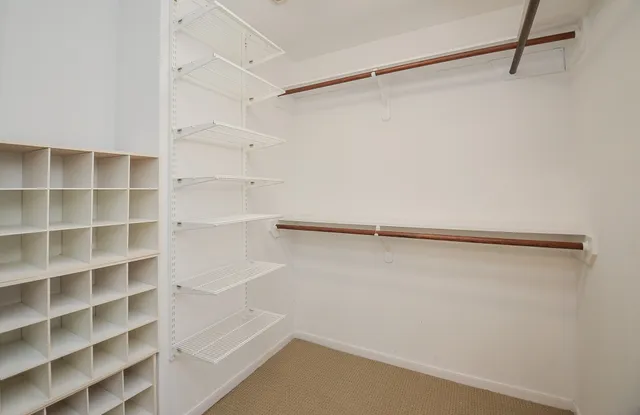 a bathroom with sink mirror and vanity