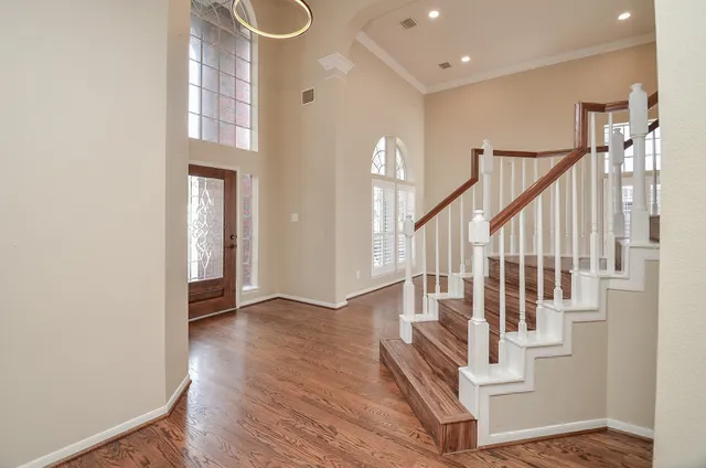 a view of entryway with wooden floor