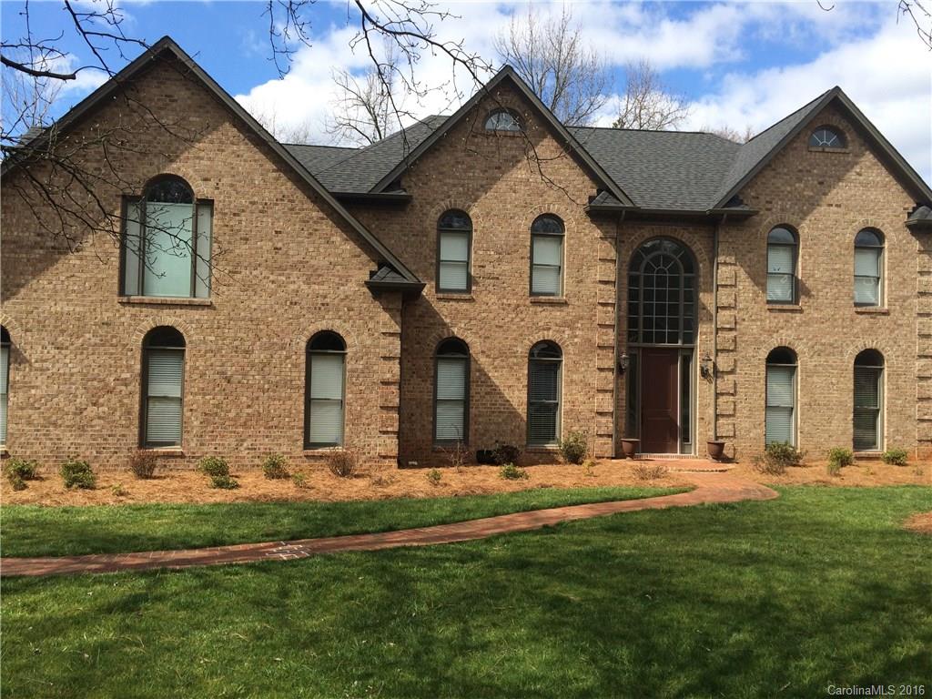 4732 Binfords Ridge Road Charlotte, NC 28226 - Photo 1 of 13 a front view of a house with a yard