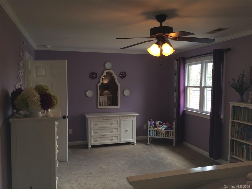 4732 Binfords Ridge Road Charlotte, NC 28226 - Photo 9 of 13 a view of an entryway with a chandelier