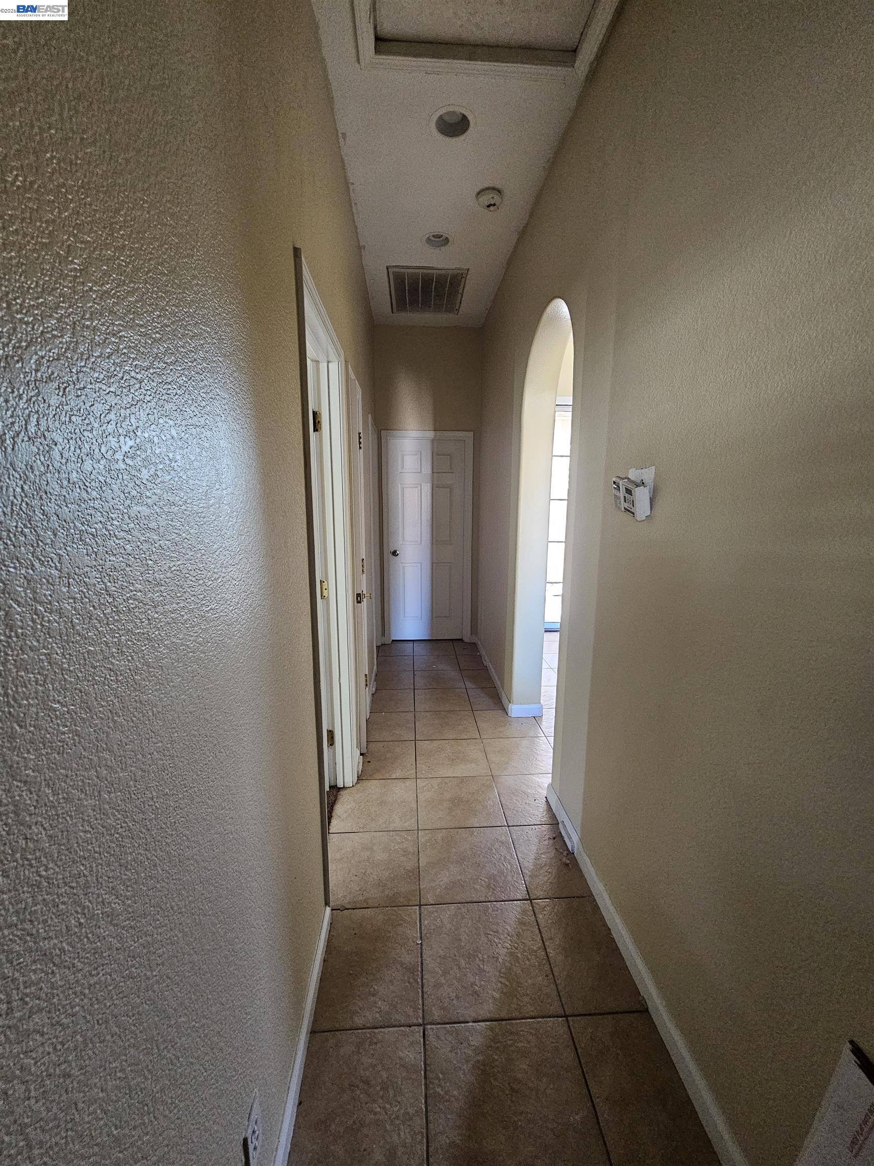 537 Bonanza Drive Newman, CA 95360 - Photo 15 of 16 a view of a hallway with a elevator