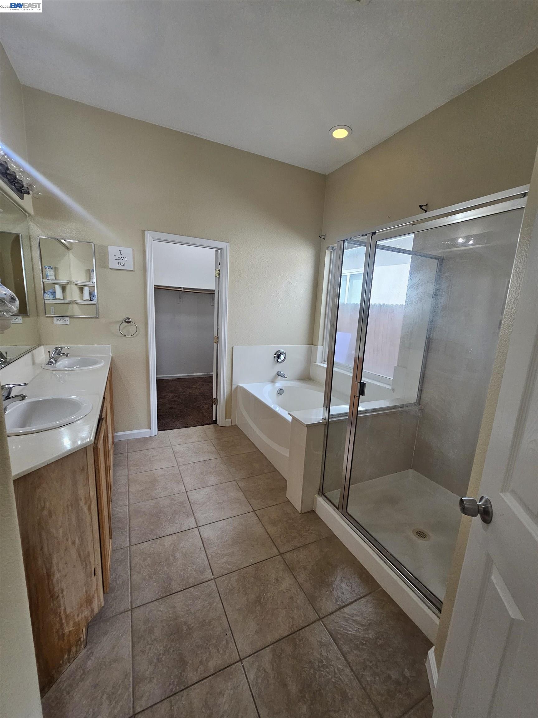 537 Bonanza Drive Newman, CA 95360 - Photo 7 of 16 a bathroom with a sink a toilet and shower