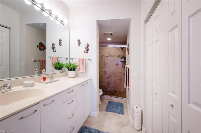 $364,900 | 4960 Deerfield Way, Unit E103, Naples, FL 34110