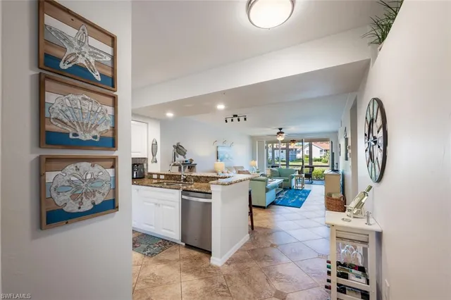 $364,900 | 4960 Deerfield Way, Unit E103, Naples, FL 34110