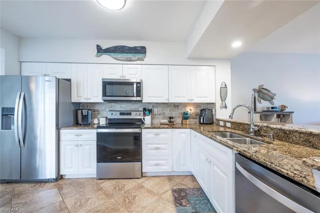 $364,900 | 4960 Deerfield Way, Unit E103, Naples, FL 34110