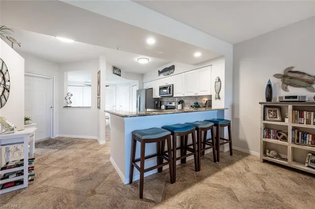 $364,900 | 4960 Deerfield Way, Unit E103, Naples, FL 34110