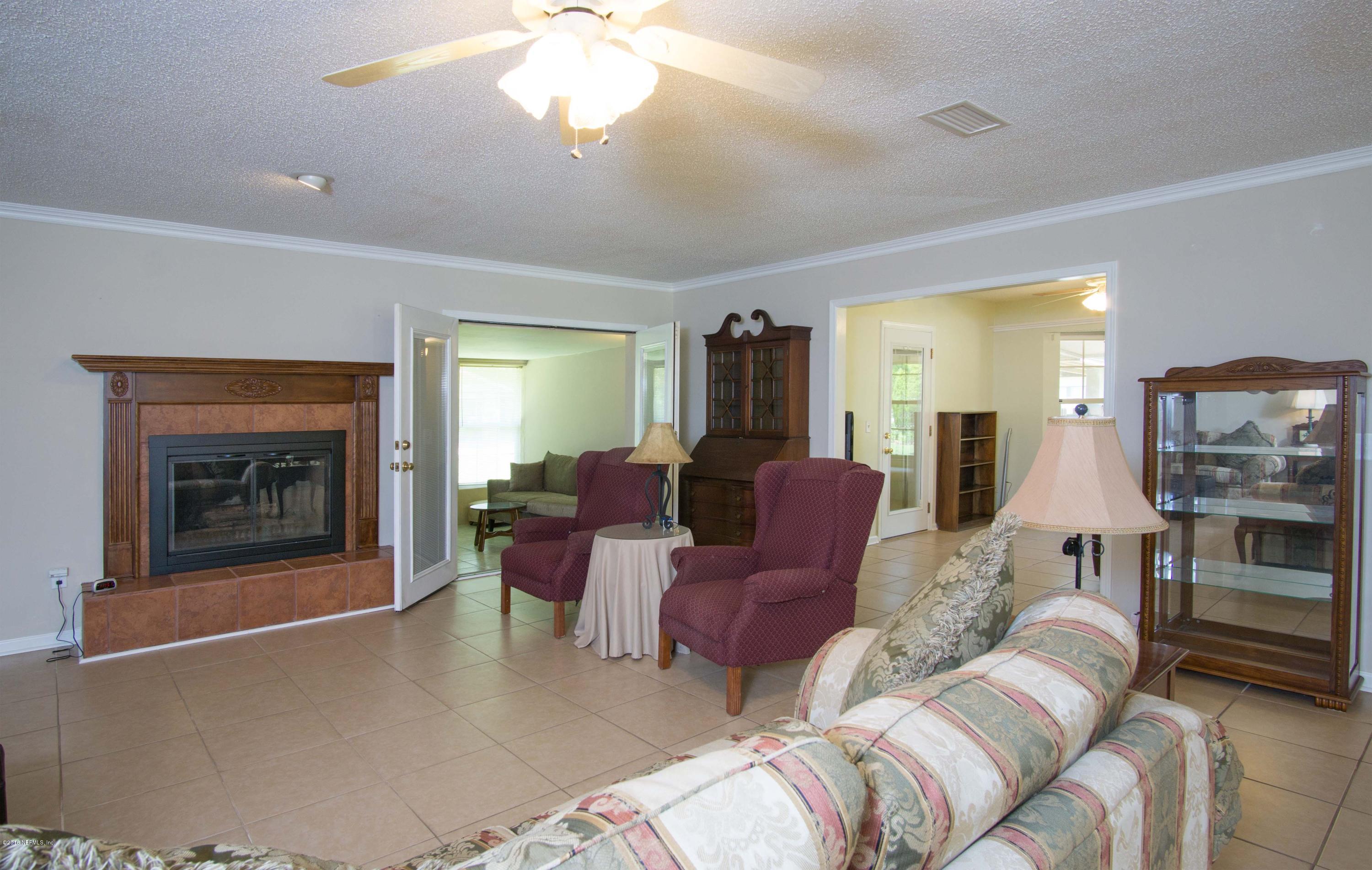 12552 Plummer Grant Road Jacksonville, FL 32258 - Photo 16 of 32 Family RM to Sitting RM & Sun RM
