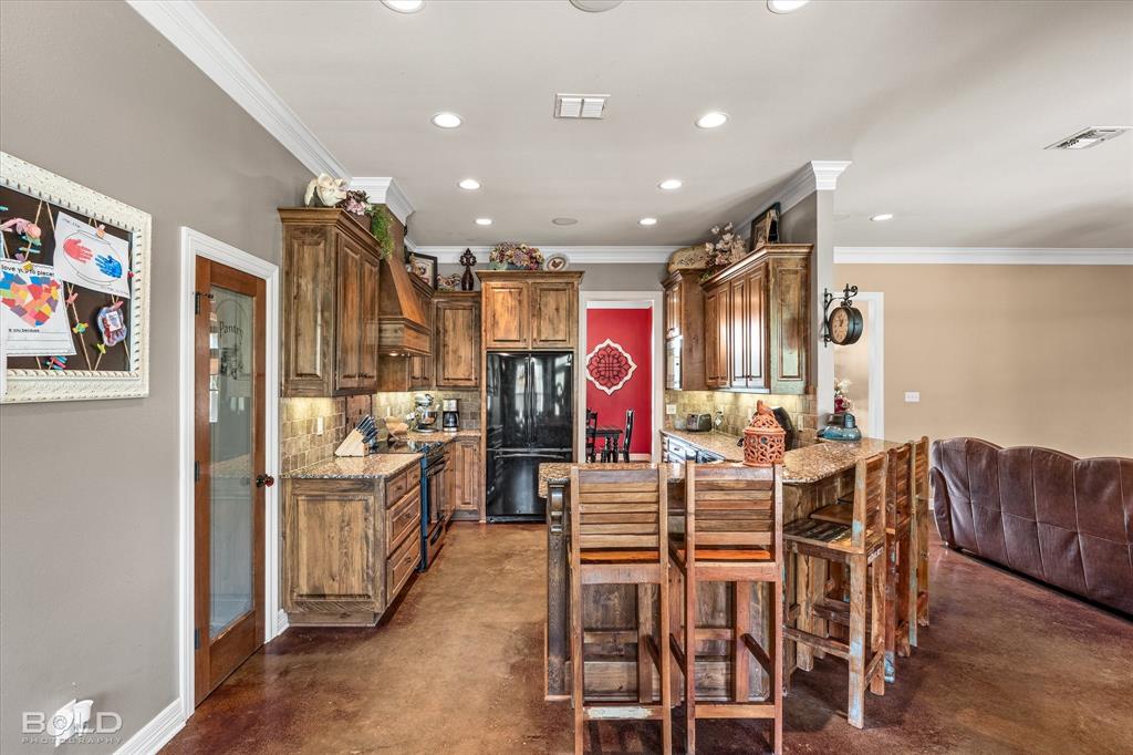 13870 Highway 157 Haughton, LA 71037 - Photo 13 of 40 a view of a dining area with furniture window and wooden floor