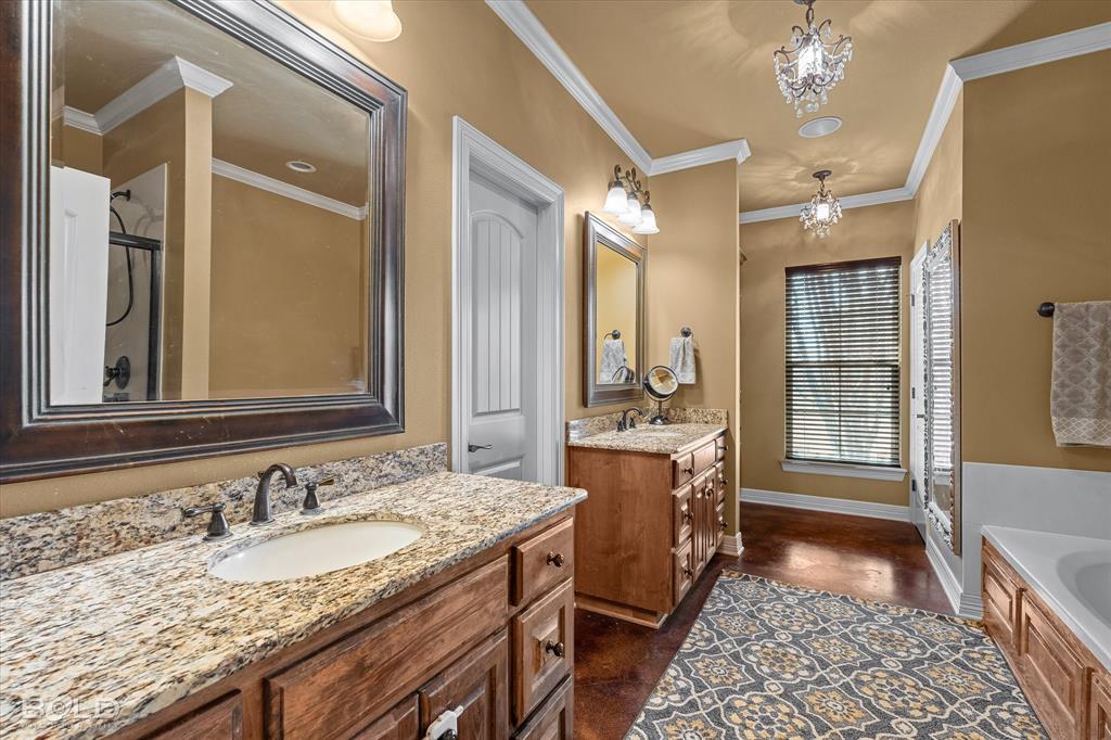 13870 Highway 157 Haughton, LA 71037 - Photo 21 of 40 a bathroom with a granite countertop sink and a mirror
