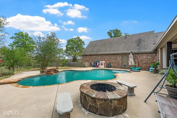 a utility room with sink dryer and washer