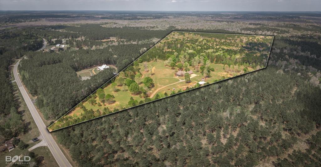 13870 Highway 157 Haughton, LA 71037 - Photo 3 of 40 a view of a lake from a balcony