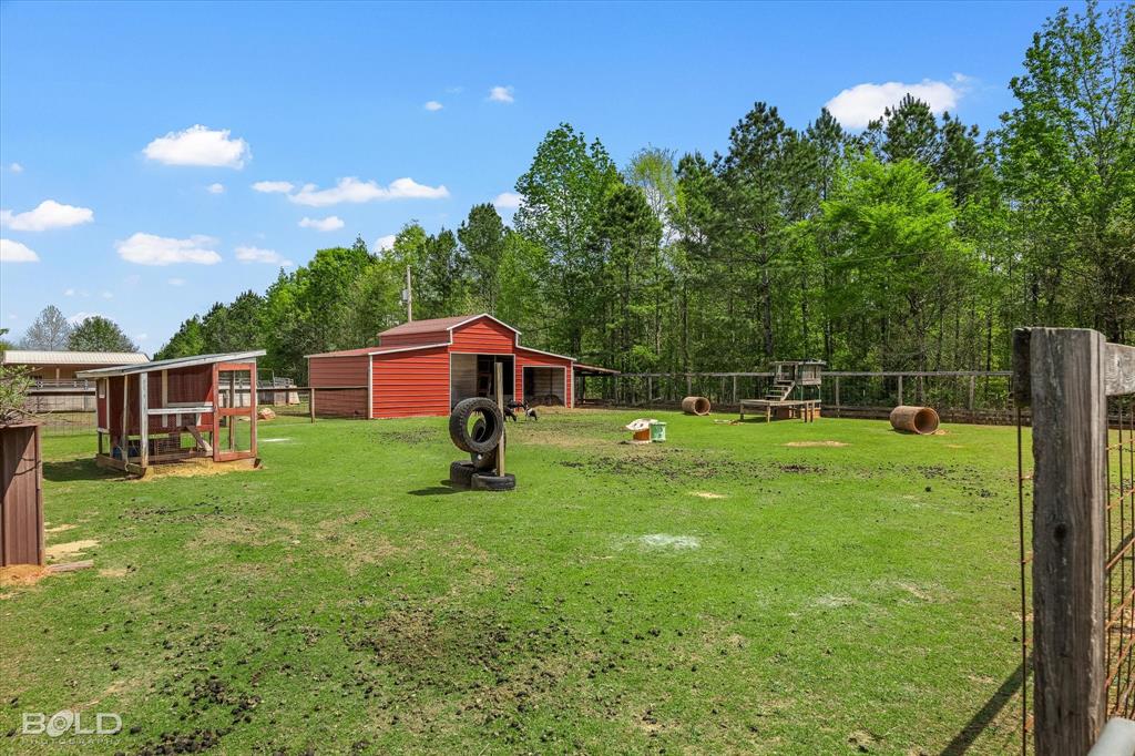 13870 Highway 157 Haughton, LA 71037 - Photo 35 of 40 a front view of a house with garden