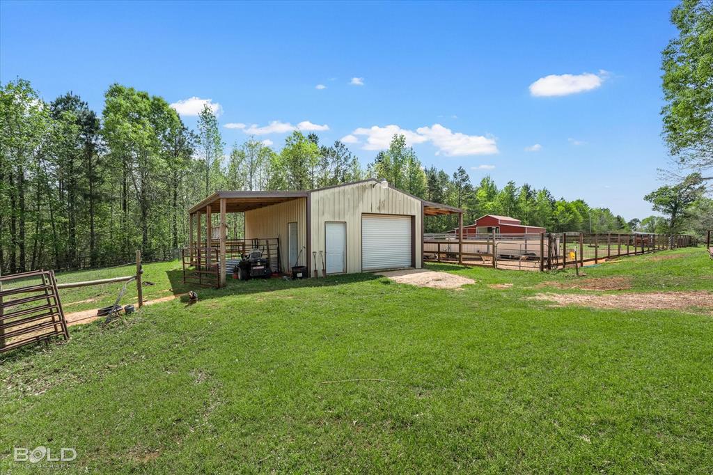 13870 Highway 157 Haughton, LA 71037 - Photo 37 of 40 a view of a house with backyard and porch