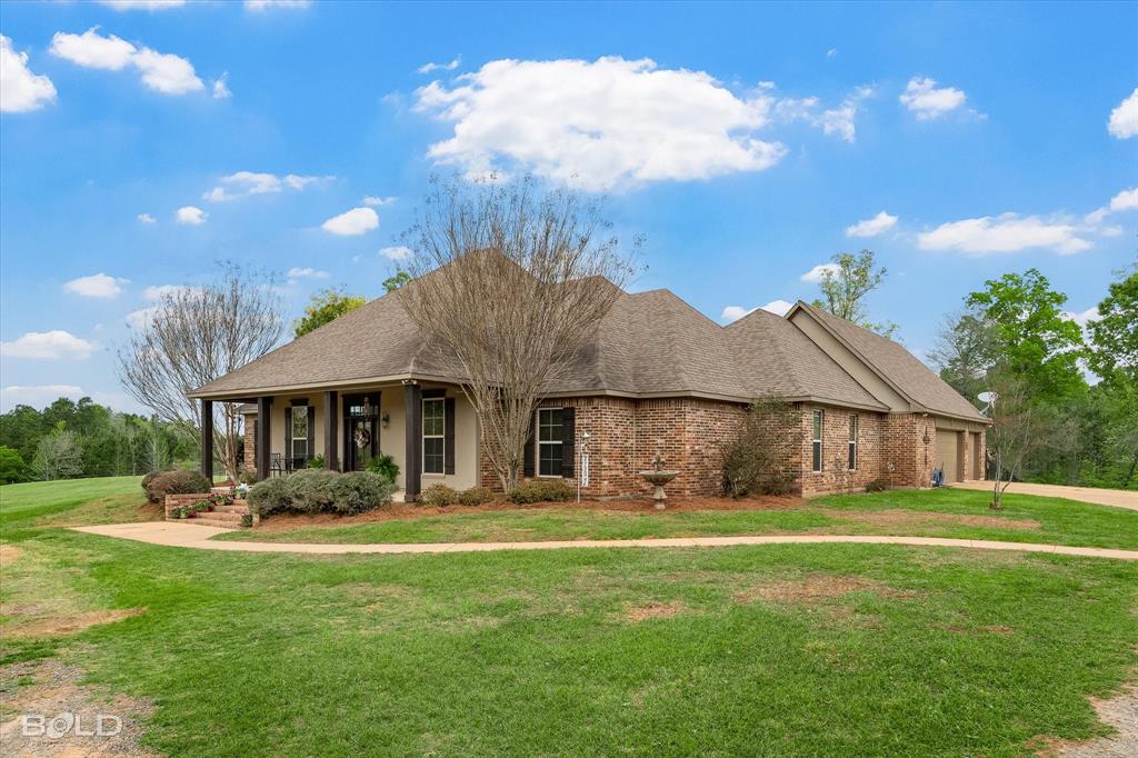 13870 Highway 157 Haughton, LA 71037 - Photo 5 of 40 a front view of house with yard