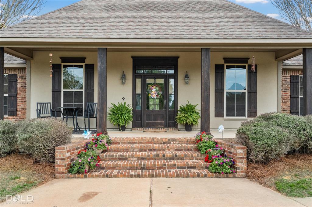 13870 Highway 157 Haughton, LA 71037 - Photo 6 of 40 front view of a brick house with a large window