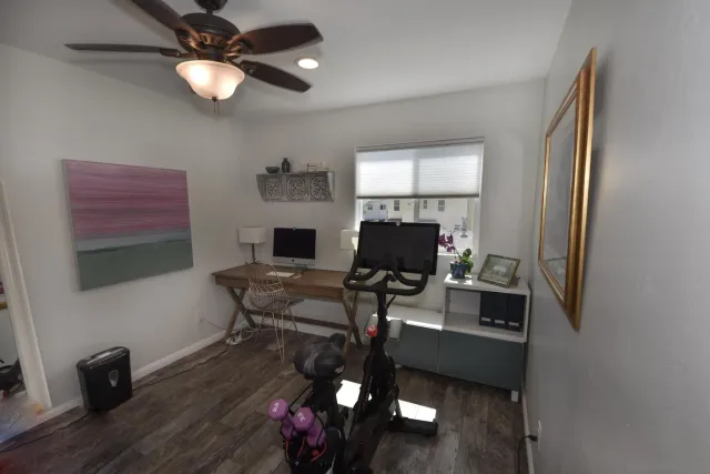 a workspace with furniture and window