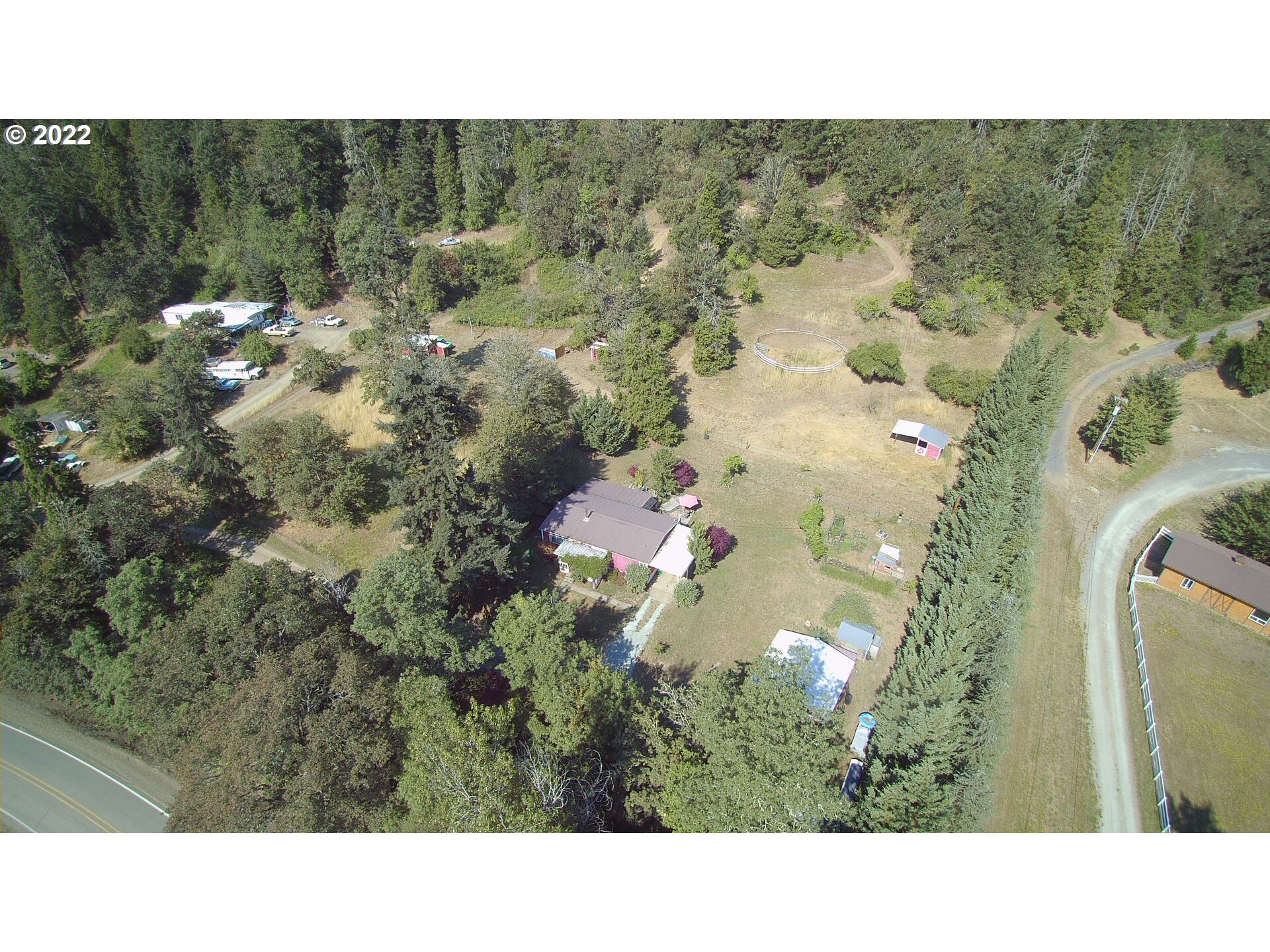 202 Homestake Lane Riddle, OR 97469 - Photo 11 of 31 a black and white photo of a house