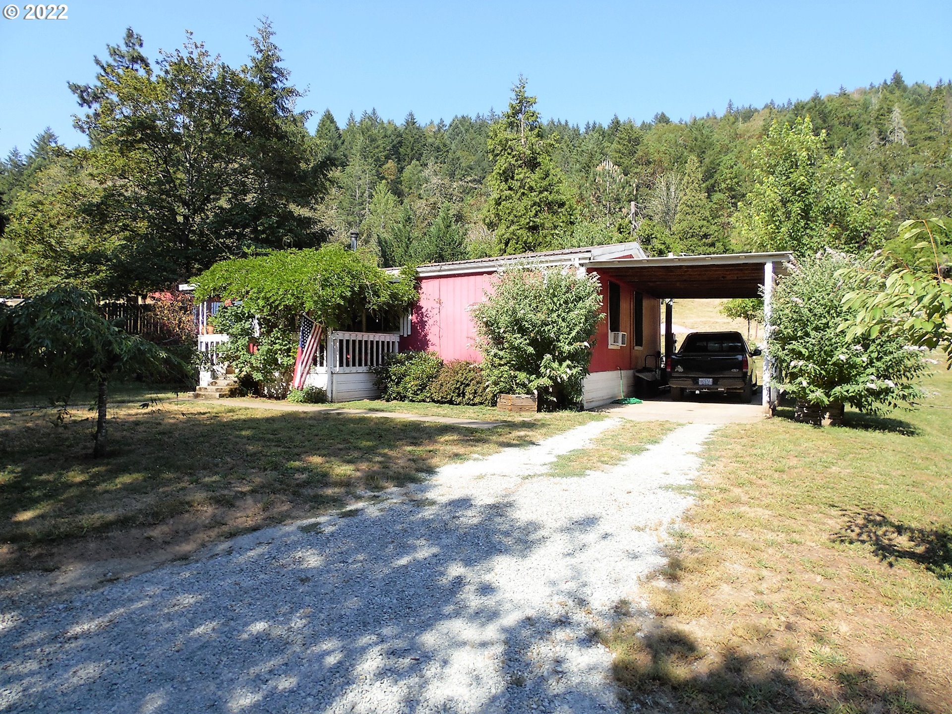 202 Homestake Lane Riddle, OR 97469 - Photo 30 of 31 a front view of a house with a yard