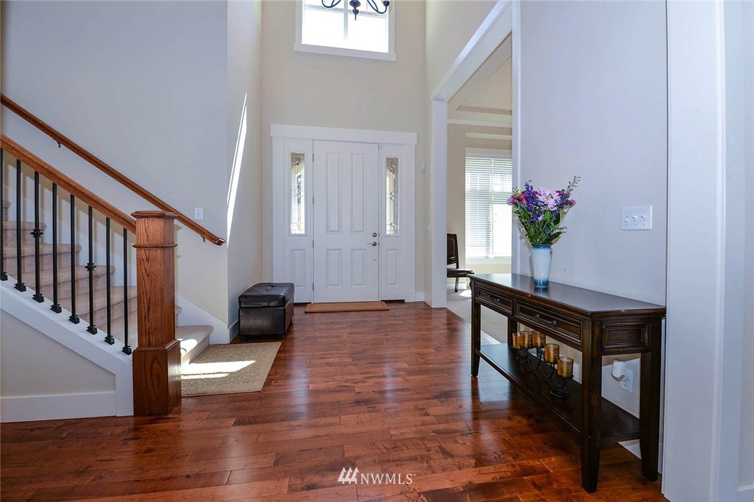 4423 220th Street Southeast Bothell, WA 98021 - Photo 11 of 24 a living room with furniture and a potted plant