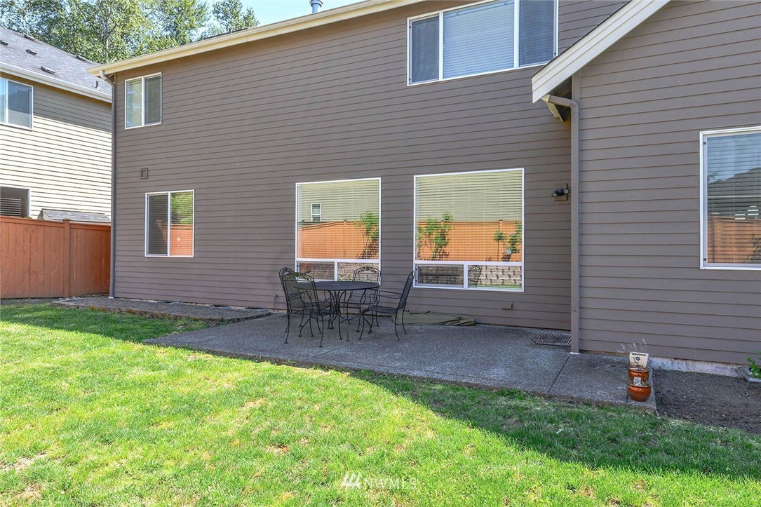 4423 220th Street Southeast Bothell, WA 98021 - Photo 22 of 24 a backyard of a house with seating space