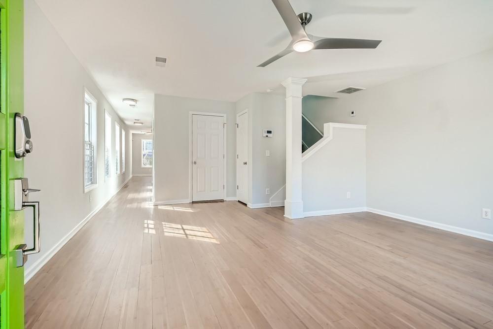 480 Rockwell Street Southwest Atlanta, GA 30310 - Photo 2 of 6 wooden floor in an empty room with a window
