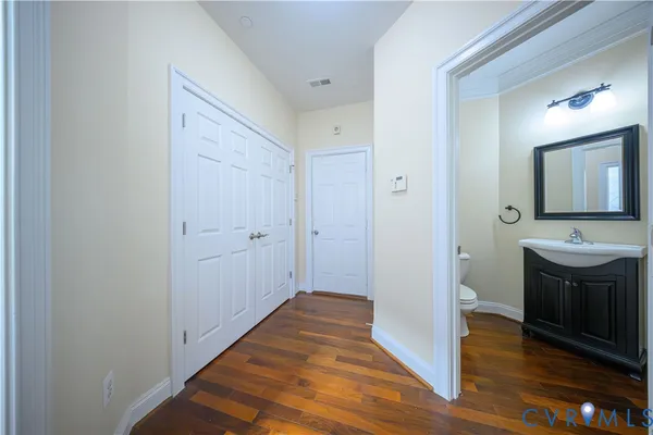 a view of a bathroom from the hallway