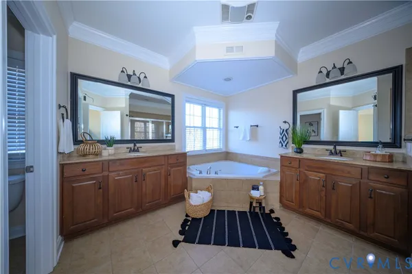a bathroom with a sink a vanity and a mirror