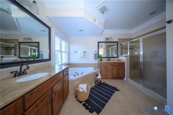 a kitchen with a sink appliances and cabinets