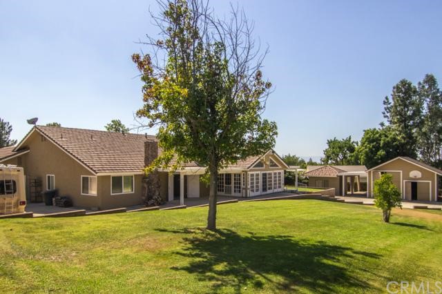 1431 Basel Place Riverside, CA 92506 - Photo 1 of 1 Back view of home and RV garage and craft room