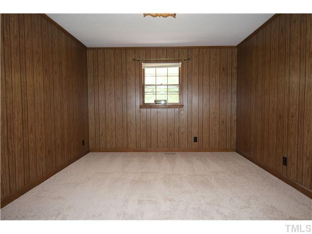 4317 Jimmy Rogers Road Durham, NC 27703 - Photo 14 of 25 Second of five bedrooms off main entrance with large closet Bedroom