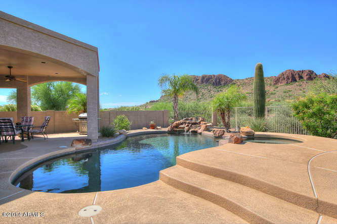 4418 South Strong Box Road Gold Canyon, AZ 85118 - Photo 21 of 22 SPARKLING HEATED PEBBLE TEC POOL