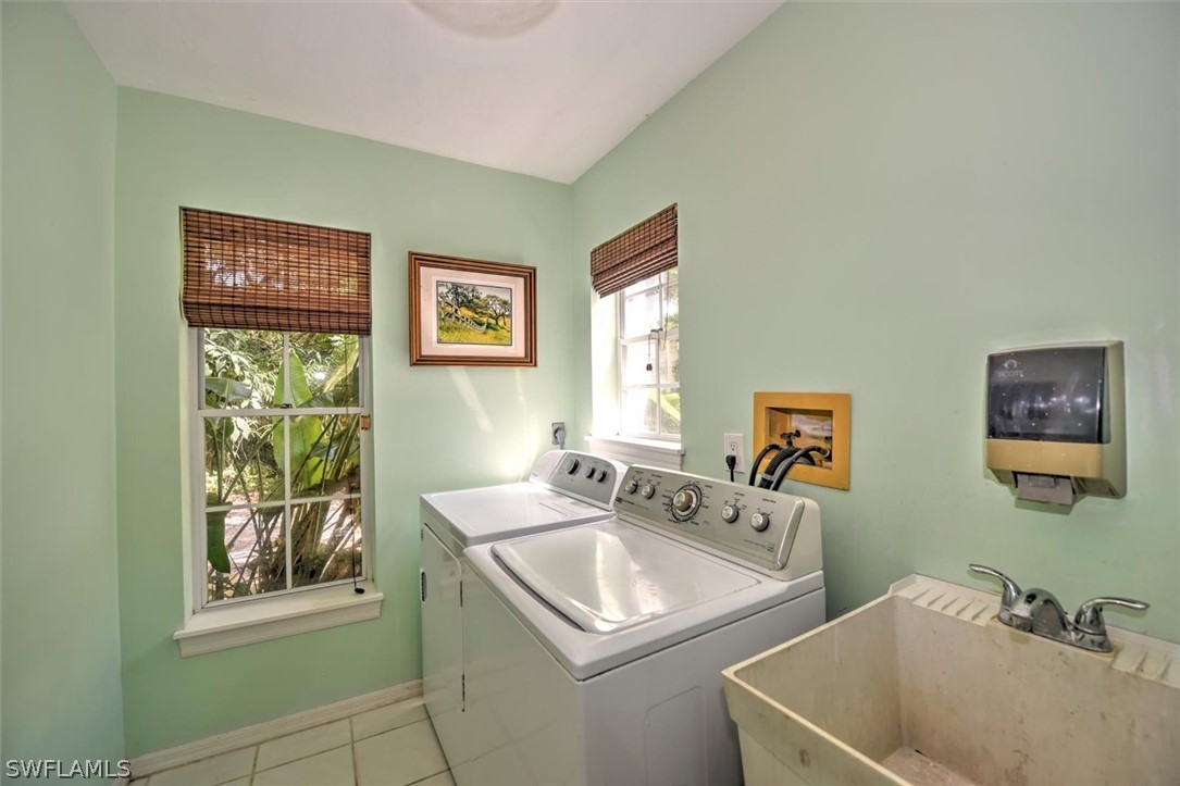 15180 Briar Ridge Circle Fort Myers, FL 33912 - Photo 15 of 35 a bathroom with a sink and a window