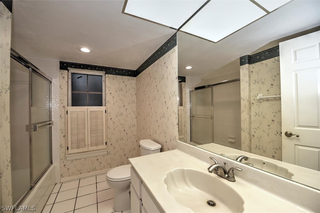 15180 Briar Ridge Circle Fort Myers, FL 33912 - Photo 21 of 35 a bathroom with a sink toilet and shower