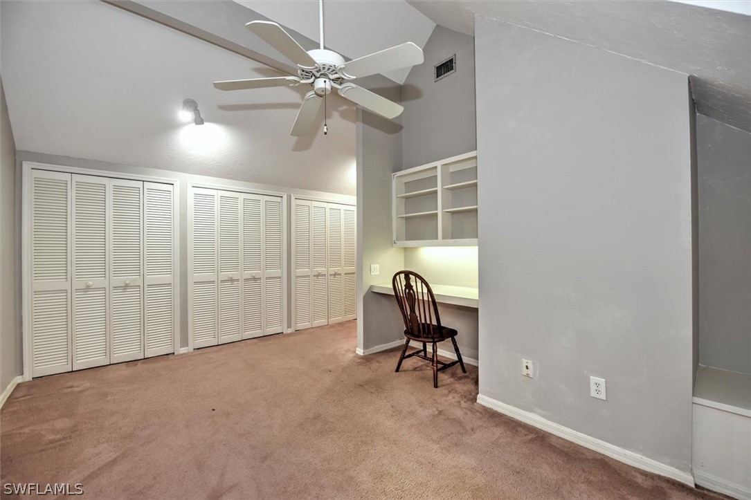 15180 Briar Ridge Circle Fort Myers, FL 33912 - Photo 29 of 35 a view of a livingroom with a furniture and chandelier fan