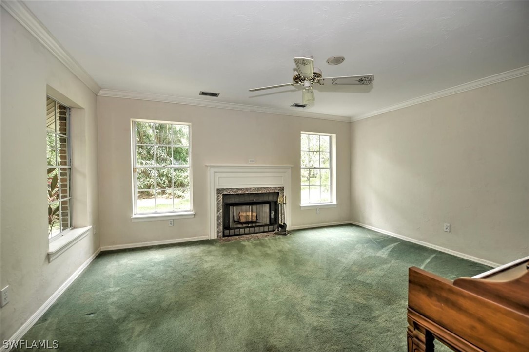 15180 Briar Ridge Circle Fort Myers, FL 33912 - Photo 7 of 35 a view of an empty room with a window