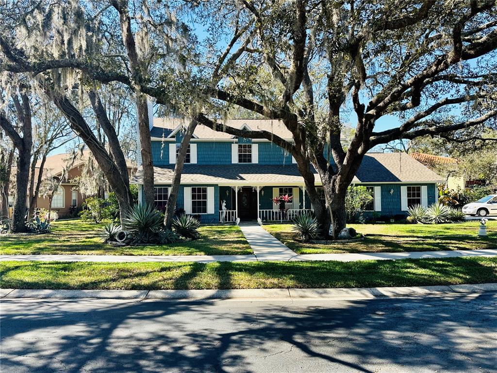 8834 Whispering Oaks Trail New Port Richey, FL 34654 - Photo 2 of 37