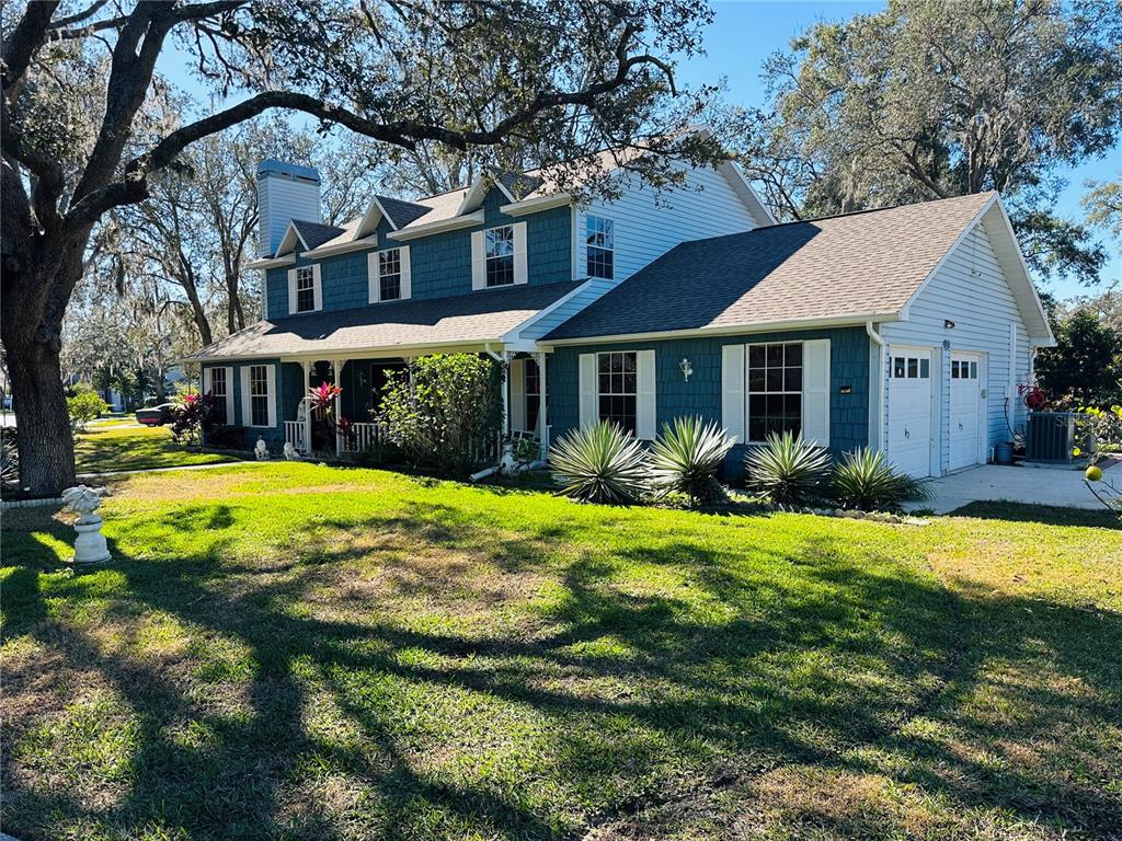 8834 Whispering Oaks Trail New Port Richey, FL 34654 - Photo 3 of 37