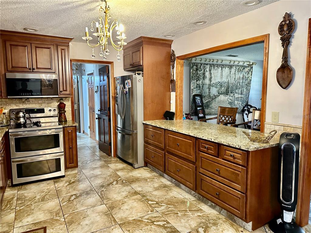 8834 Whispering Oaks Trail New Port Richey, FL 34654 - Photo 9 of 37