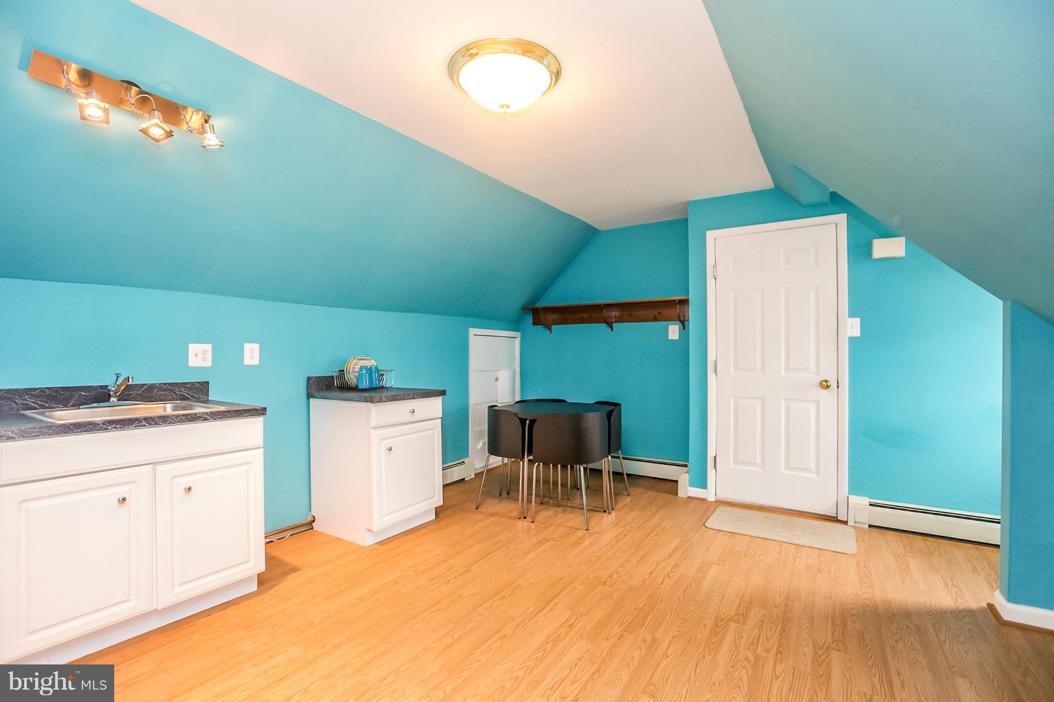 17216 Hunter Green Road Upperco, MD 21155 - Photo 22 of 30 a kitchen with a refrigerator and a sink