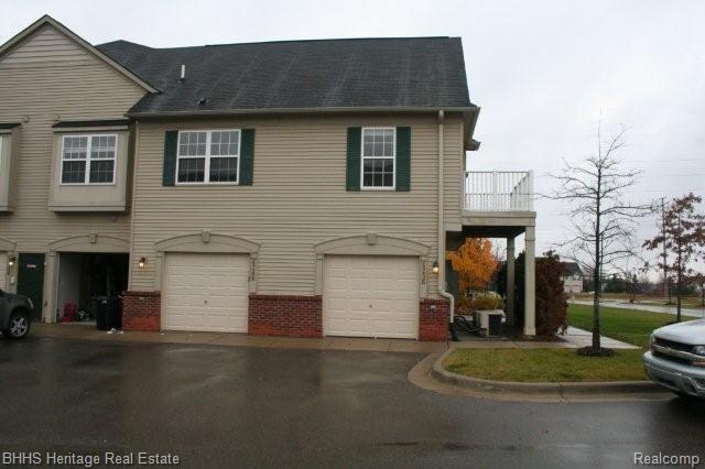4256 Hampton Ridge Boulevard, Unit 151 Howell, MI 48843 - Photo 3 of 15 Garage