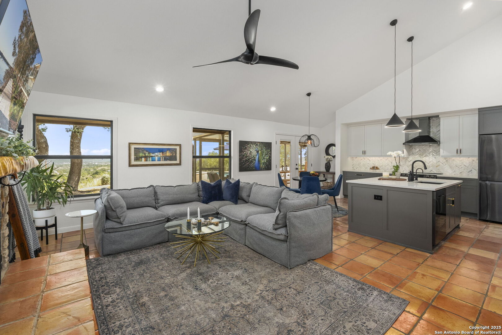 26938 Karsch Road Boerne, TX 78006 - Photo 14 of 60 a living room with furniture kitchen and a chandelier