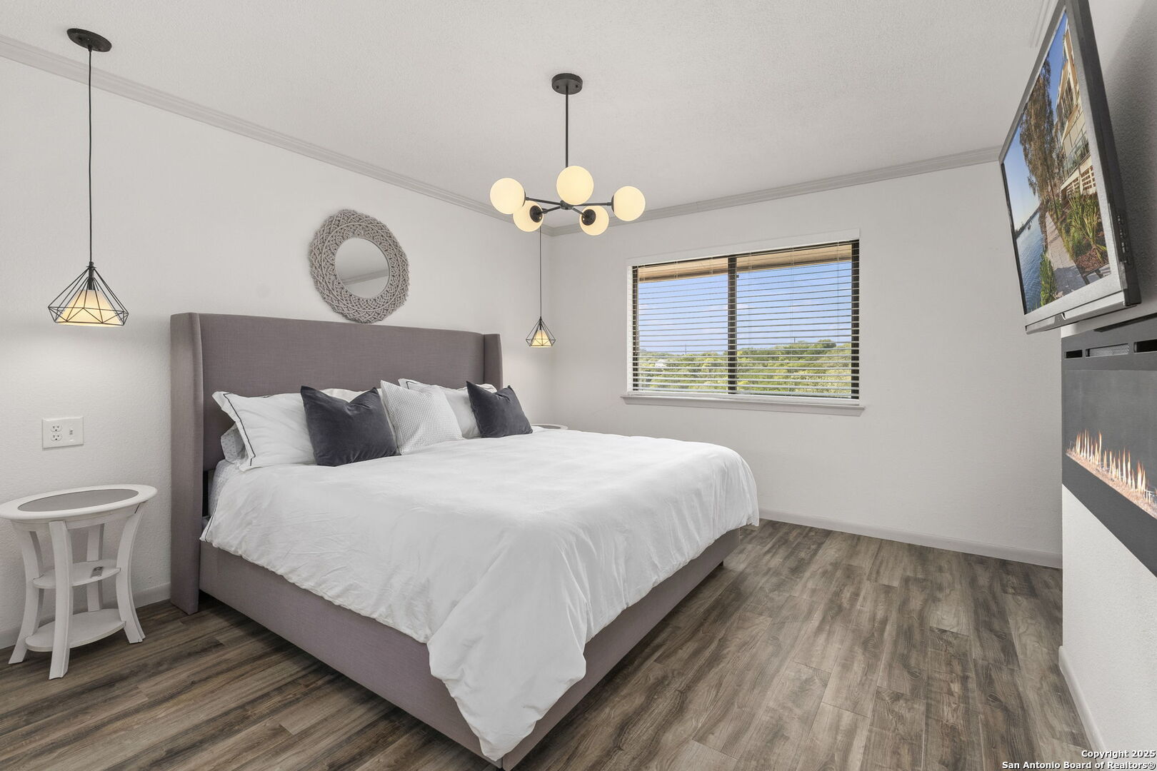 26938 Karsch Road Boerne, TX 78006 - Photo 18 of 60 a bedroom with bed and wooden floor