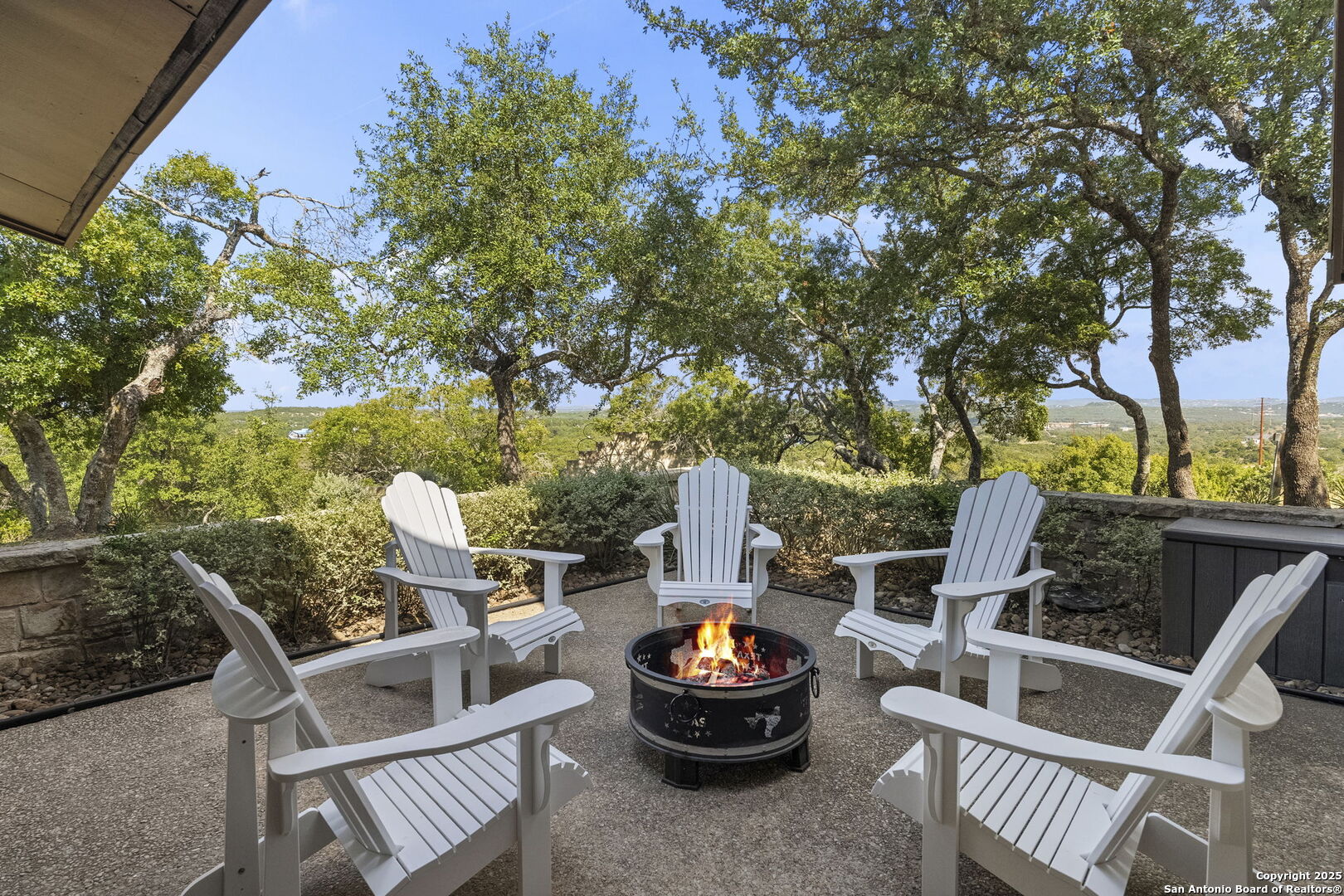 26938 Karsch Road Boerne, TX 78006 - Photo 22 of 60 a backyard of a house with table and chairs